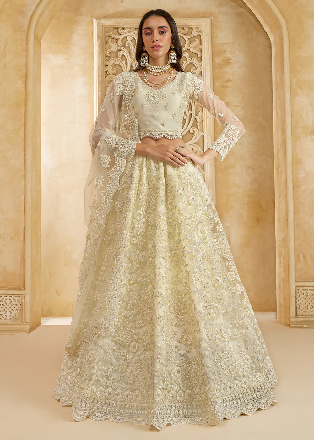 Adorable Cream Heavy Net Embroidered Bridal Lehenga Choli