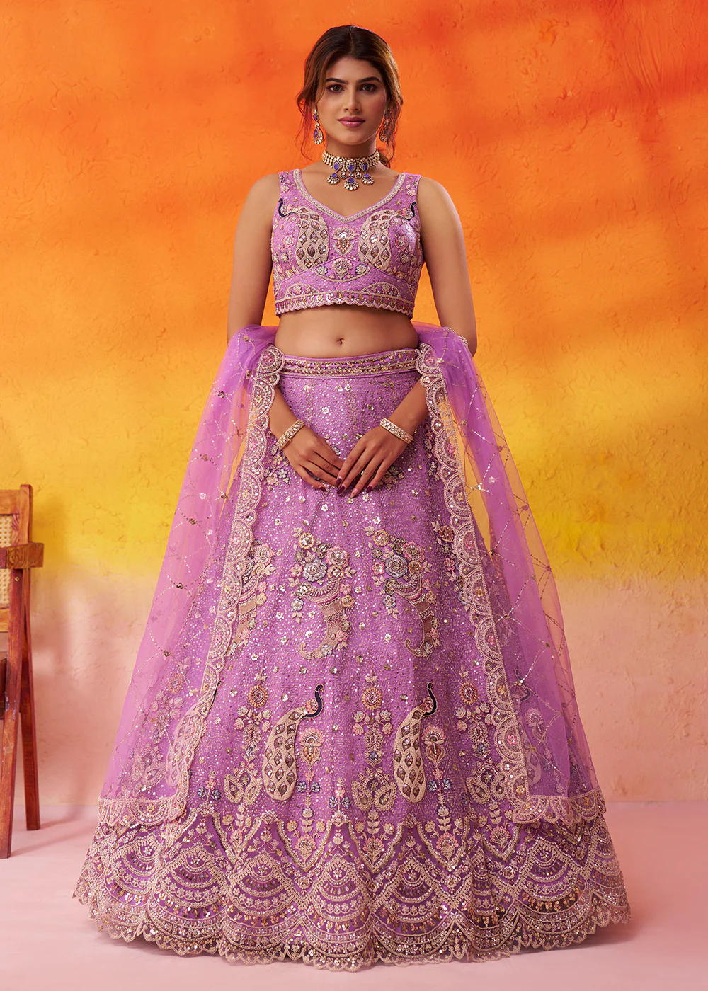 Attractive Mauve Net Embroidered Wedding Lehenga Choli