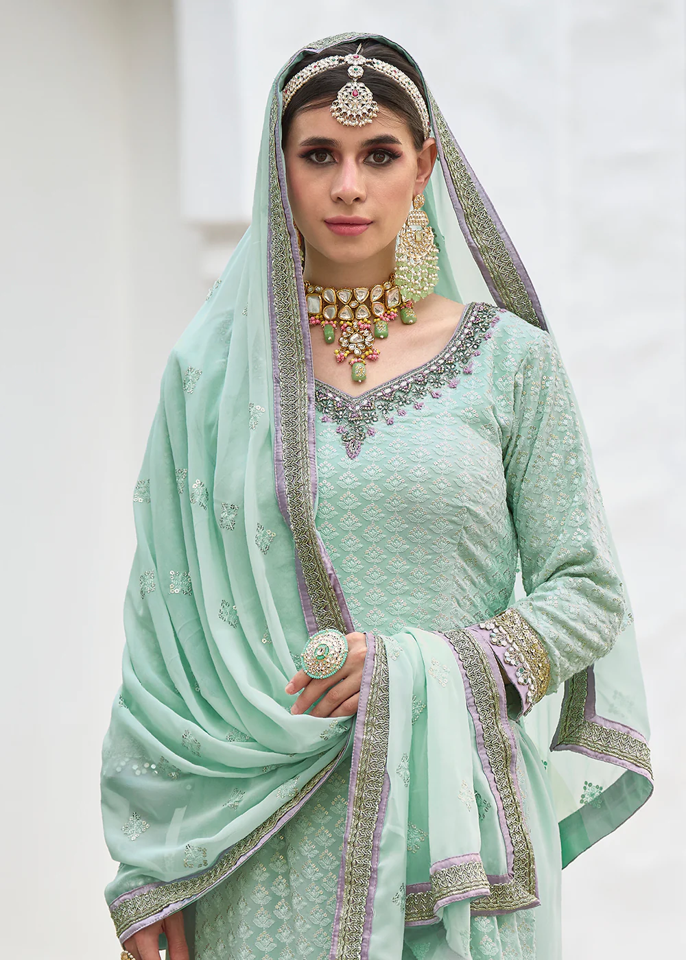 Beautiful Aqua Blue Heavy Embroidered Festive Gharara Style Suit - Image 2