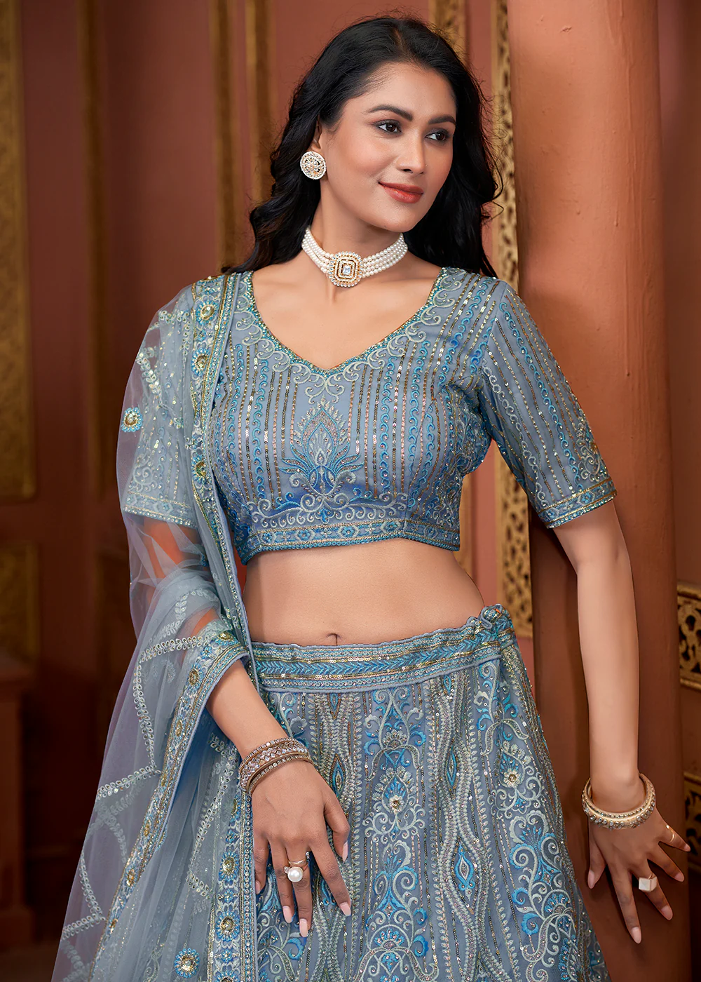 Blue Heavy Embroidered Wedding Wear Lehenga Choli - Image 2