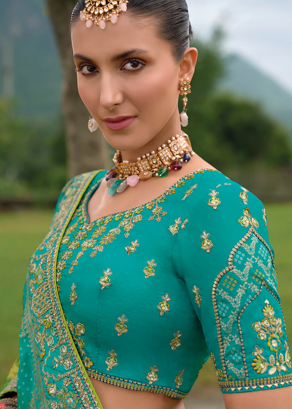 Bridal Teal Blue Heavy Embroidered Designer Lehenga Choli - Image 4