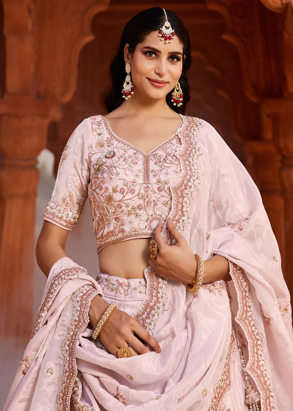 Designer Coral Pink Embroidered Bridal Lehenga Choli - Image 2