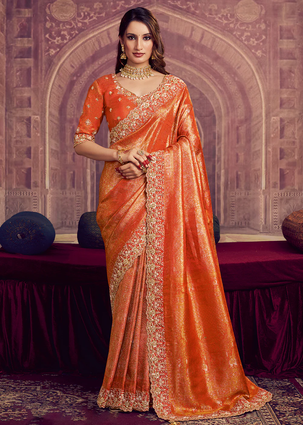 Dreamy Orange Heavy Embroidered Designer Wear Saree