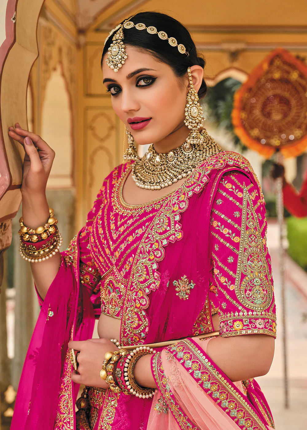 Enticing Pink Bridal Wear Heavy Embroidered Silk Lehenga Choli - Image 2