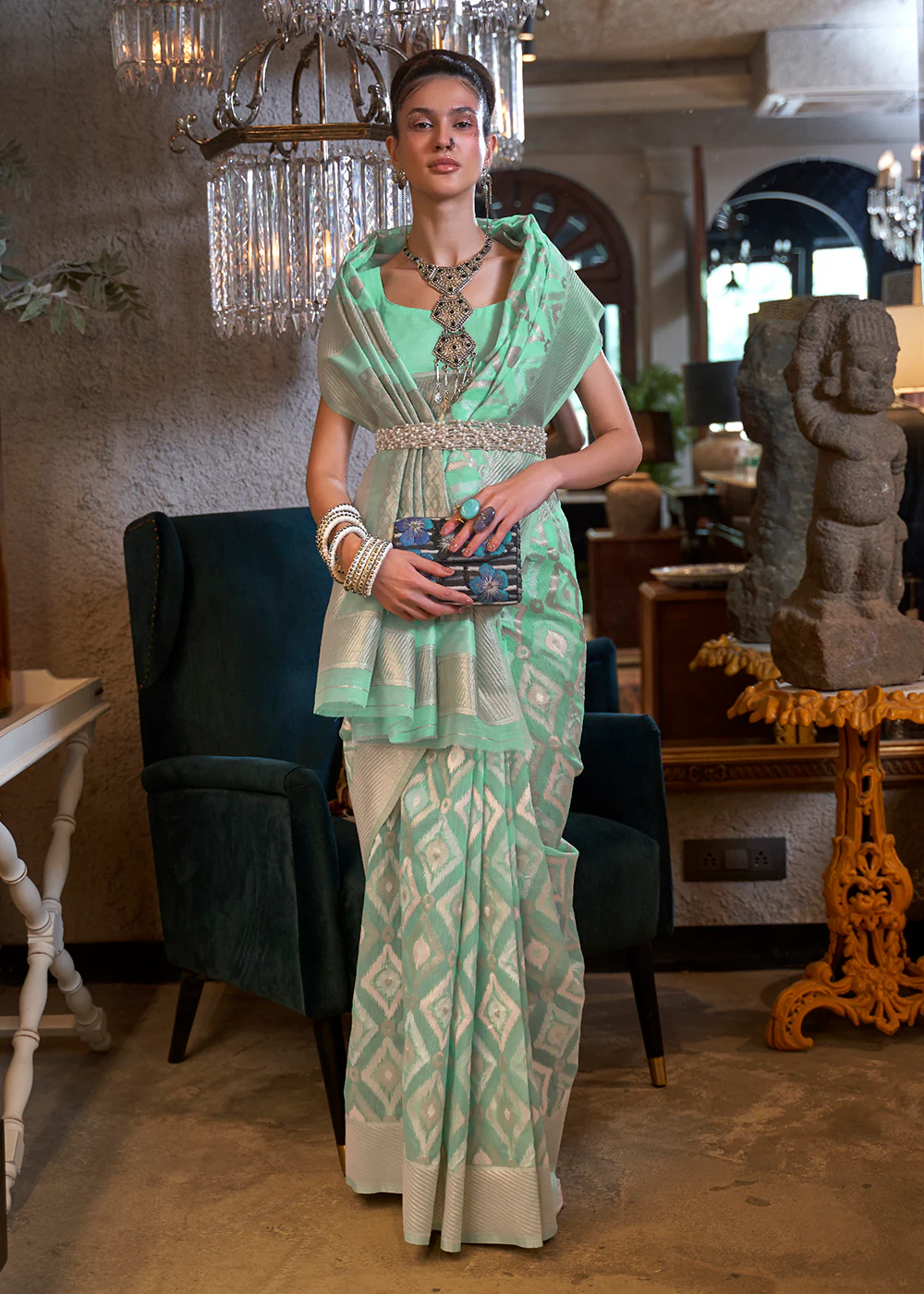 Fascinating Mint Green Zari Weaving Linen Designer Saree