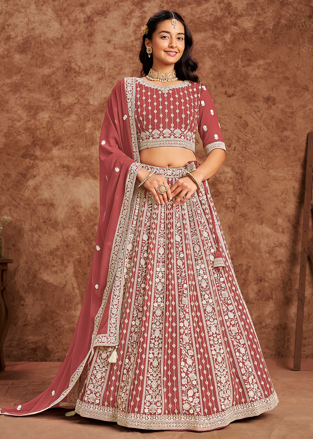 Faux Georgette Peach Color Embroidered Lehenga Choli