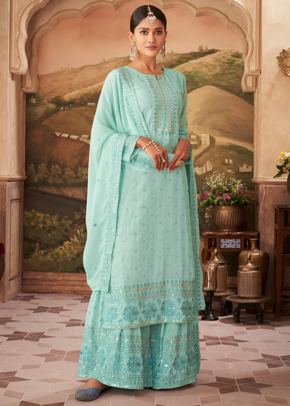 Heavy Faux Georgette Sky Blue Embroidered Palazzo Suit
