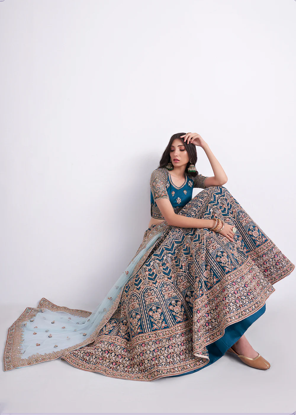 Imposing Teal Blue Wedding Style Designer Bridal Lehenga Choli - Image 3