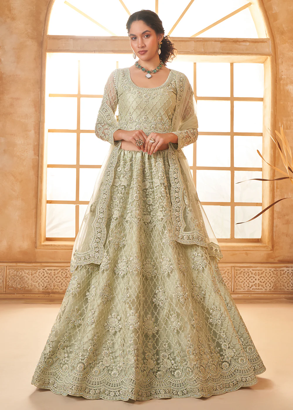 Lovely Green Heavy Net Embroidered Bridal Lehenga Choli