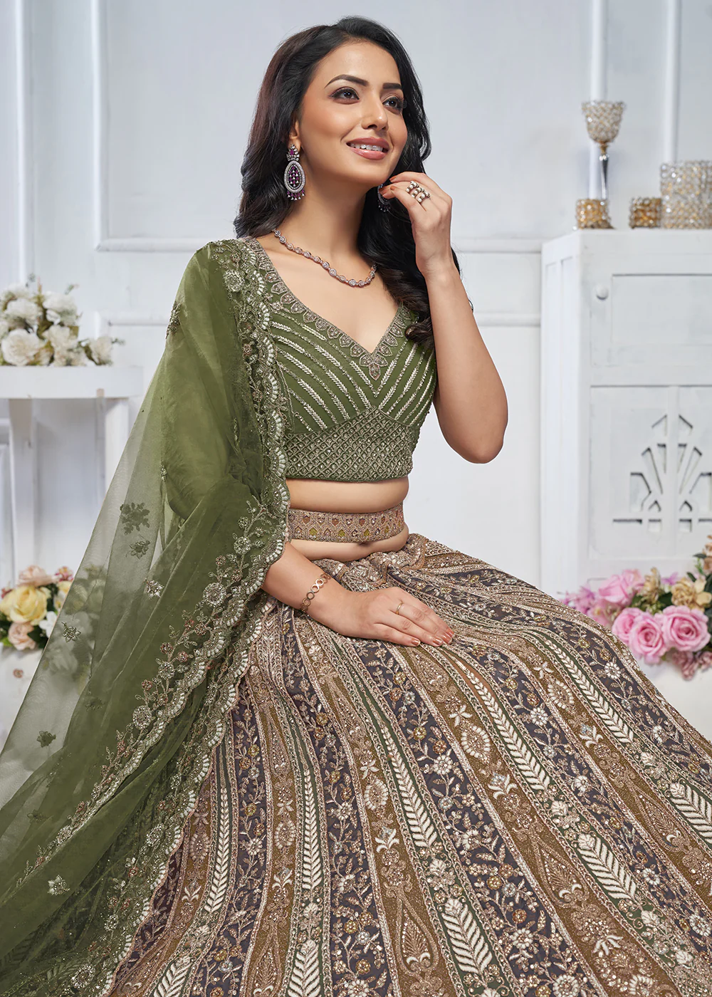 Majestic Green Heavy Embroidered Reception Lehenga Choli - Image 2