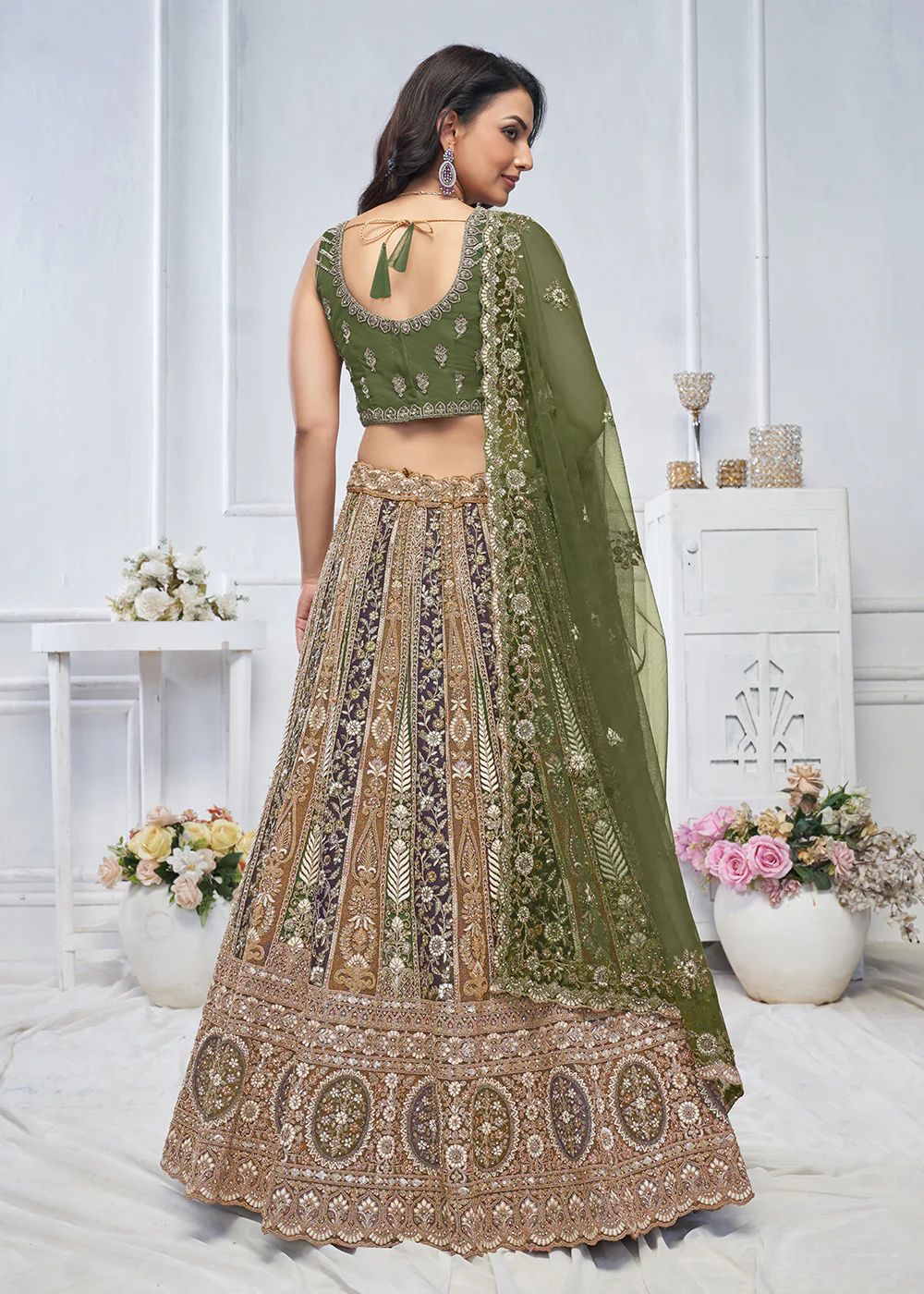 Majestic Green Heavy Embroidered Reception Lehenga Choli - Image 3