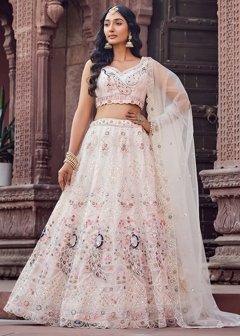 Net Fabric Stone Work Cream Wedding Lehenga Choli