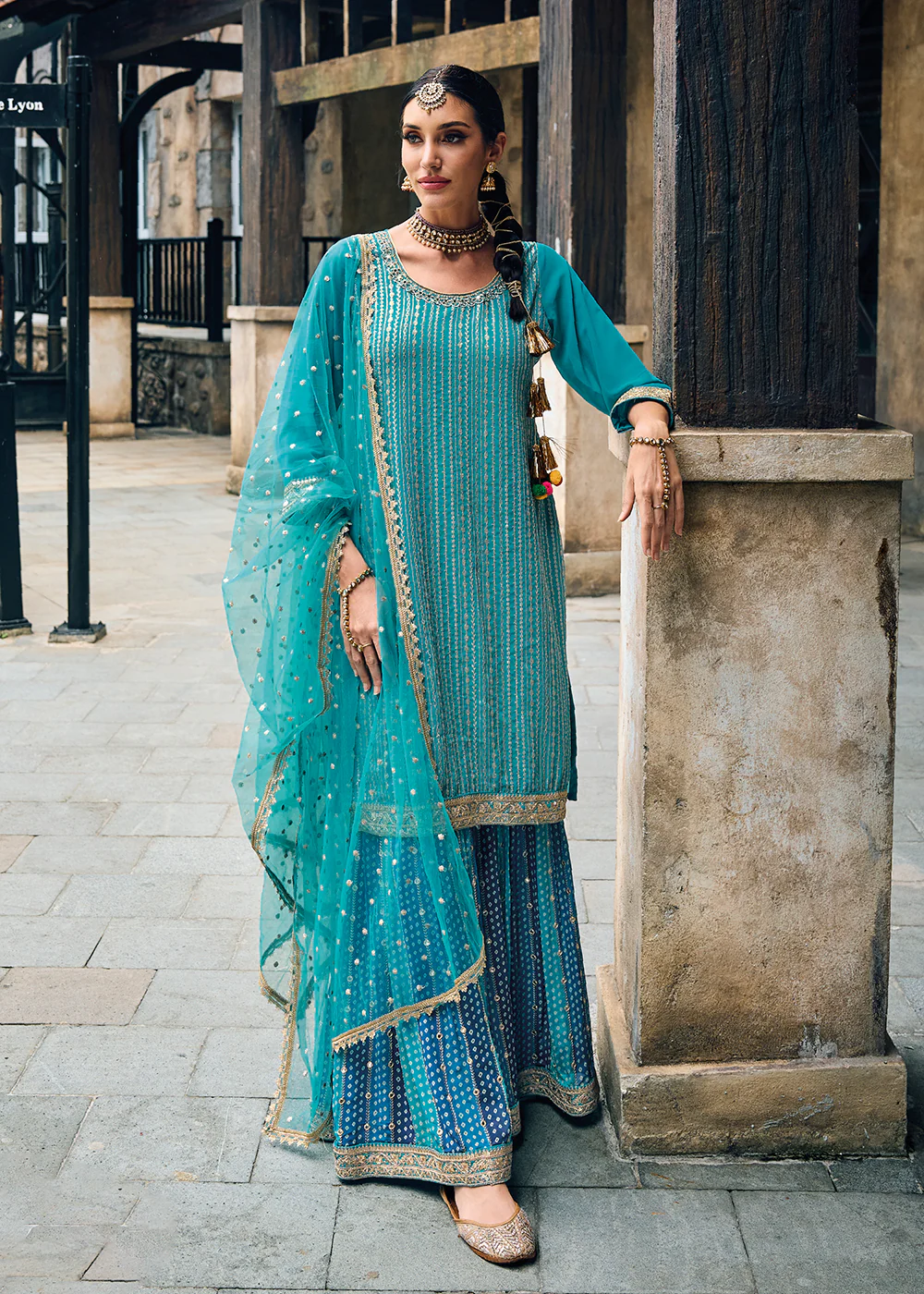Punjabi Style Turquoise Embroidered Designer Palazzo Suit - Image 3