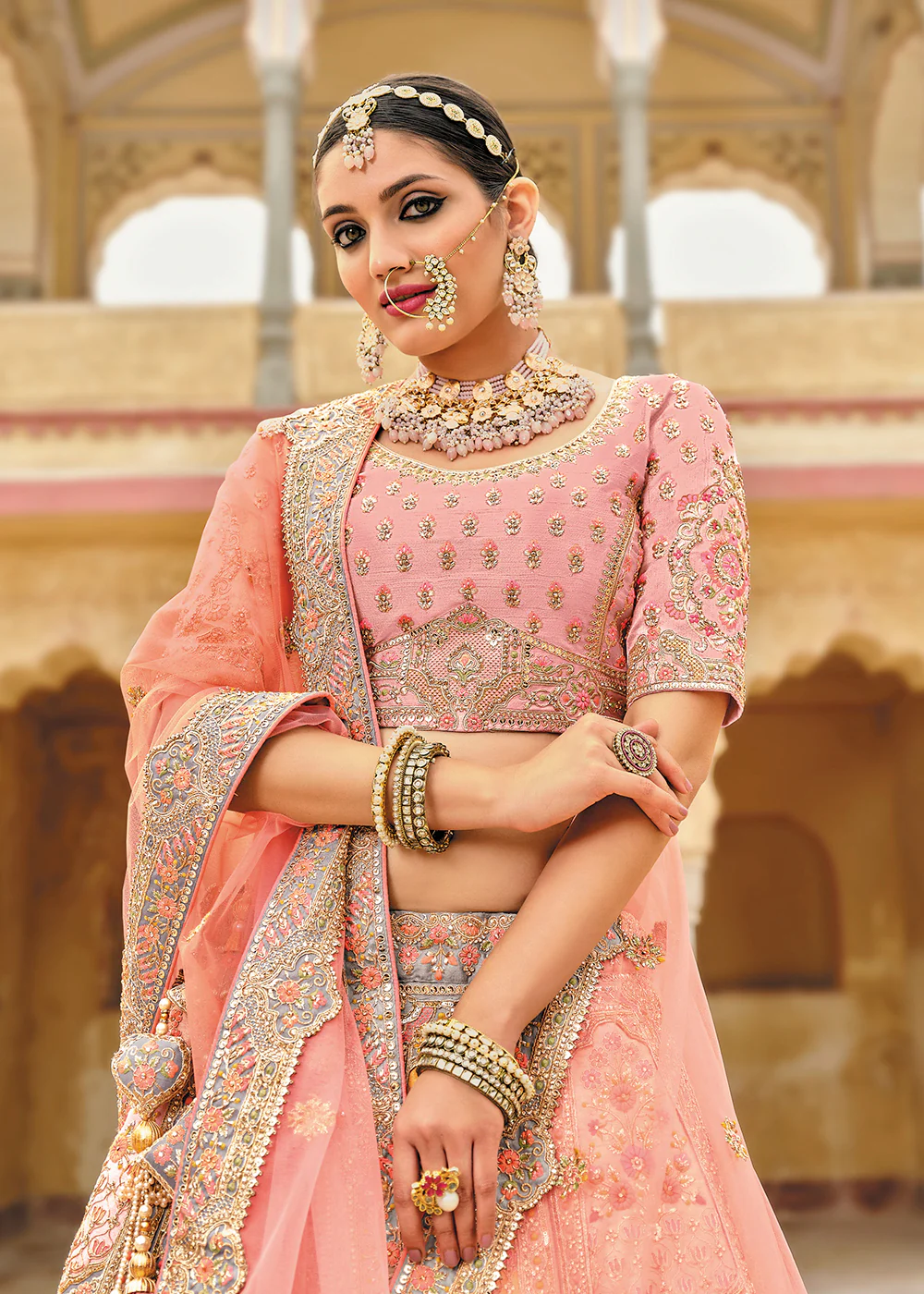 Radiant Peach Bridal Wear Heavy Embroidered Silk Lehenga Choli - Image 2