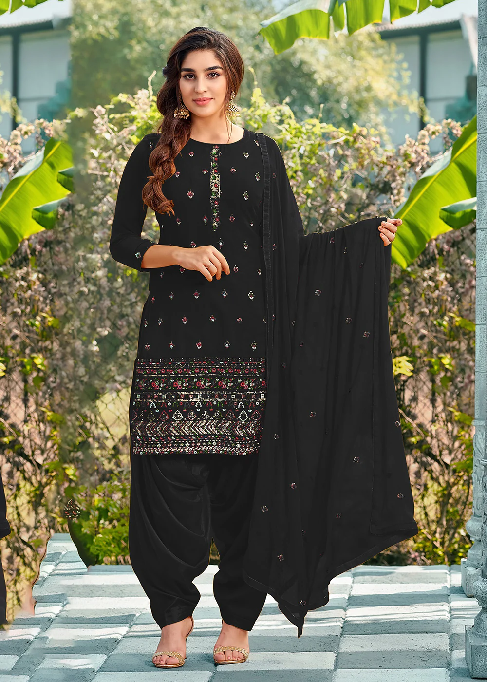 Riveting Black Punjabi Style Embroidered Georgette Patiala Suit