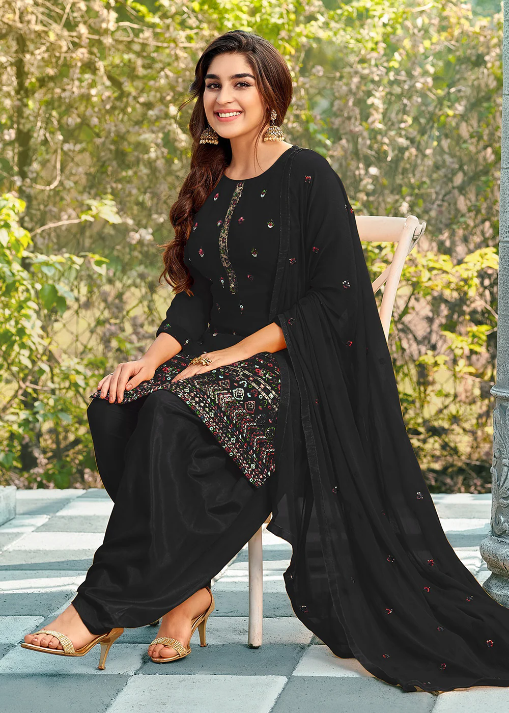 Riveting Black Punjabi Style Embroidered Georgette Patiala Suit - Image 3