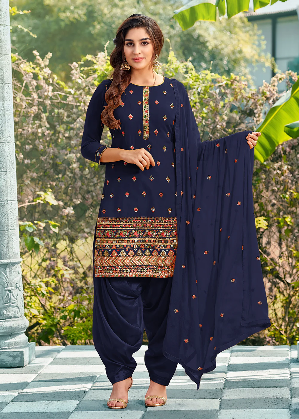 Riveting Blue Punjabi Style Embroidered Georgette Patiala Suit