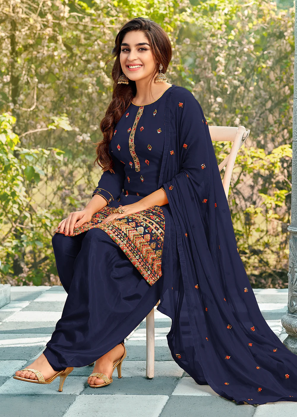 Riveting Blue Punjabi Style Embroidered Georgette Patiala Suit - Image 3