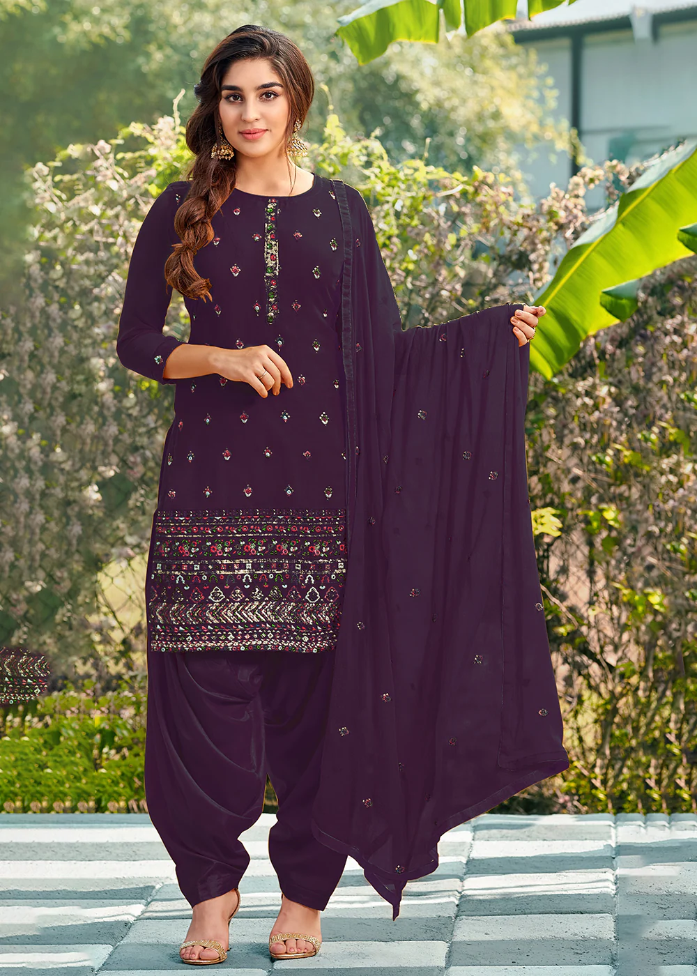 Riveting Purple Punjabi Style Embroidered Georgette Patiala Suit