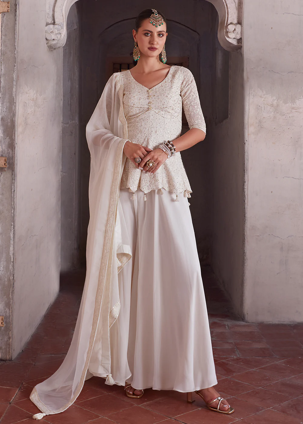 Spectacular Off White Georgette Peplum Style Sharara Suit