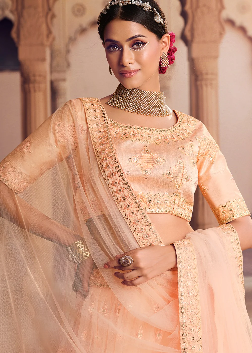 Wondrous Light Orange Tiered Heavy Lehenga Choli - Image 2