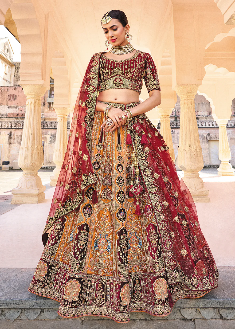Yellow & Maroon Bridal Wear Heavy Embroidered Silk Lehenga Choli